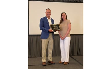 Jason Banonis Holds PDI Attorney of the Year Award with the PDI President